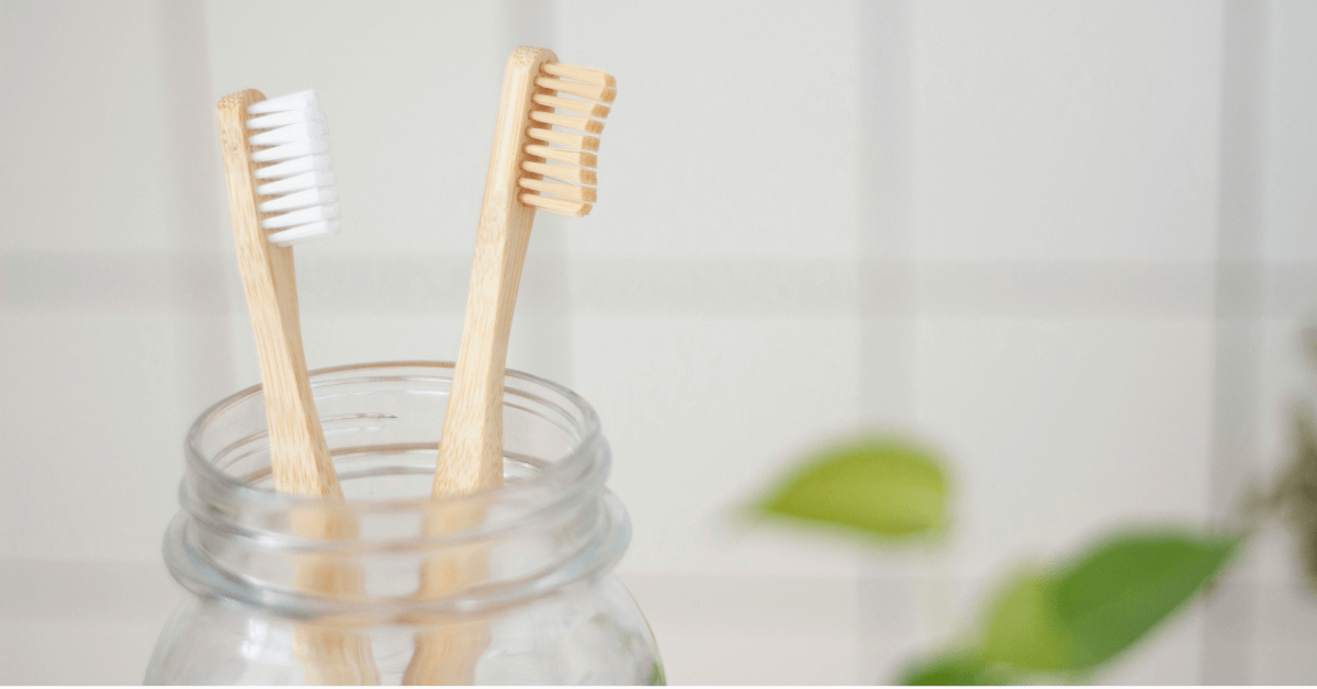 bamboo toothbrush in zero waste bathroom