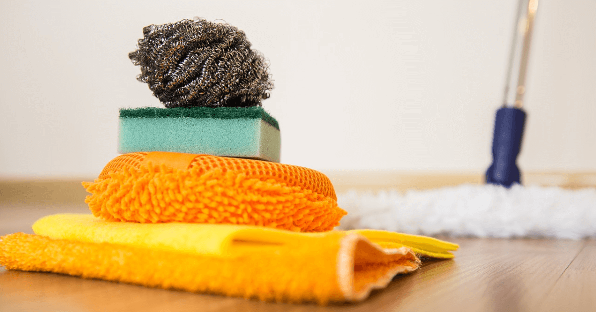 mop, cloth and sponges for cleaning floor tiles
