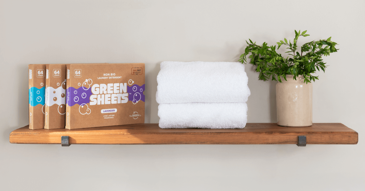 decluttered cleaning supplies with greensheets neatly on shelf