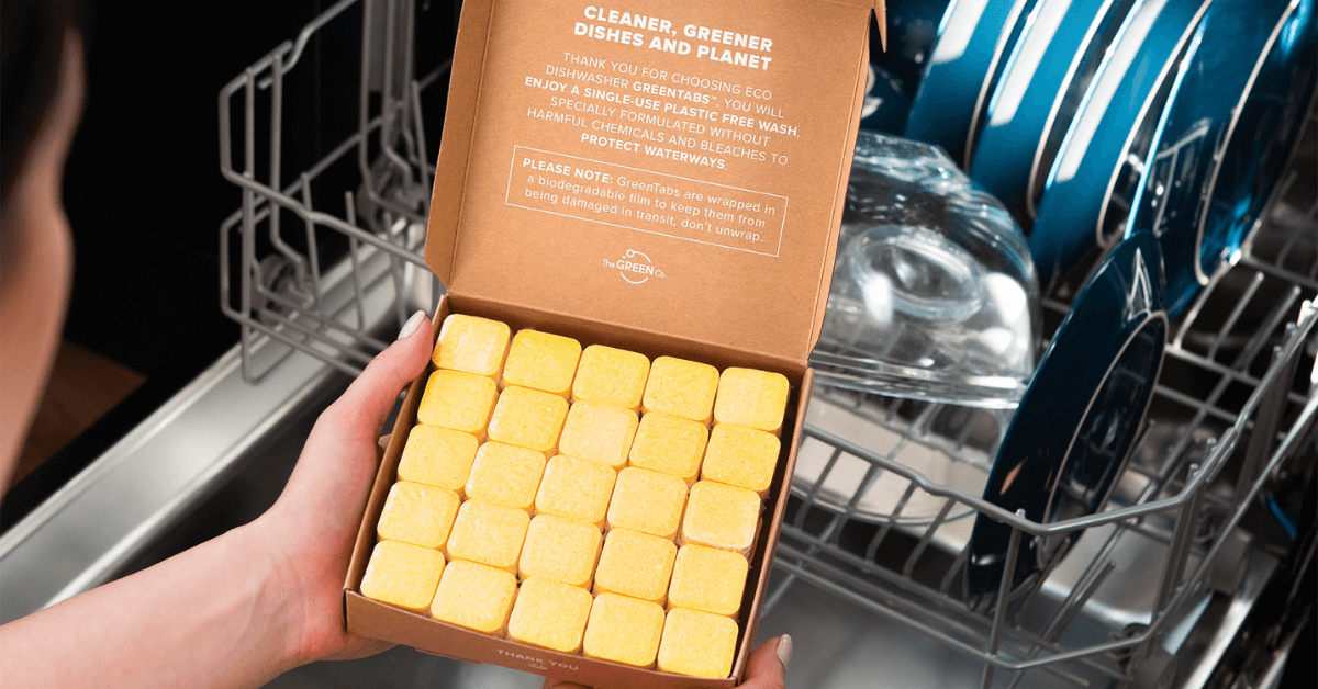 dishwasher greentabs in packaging open over dishwasher