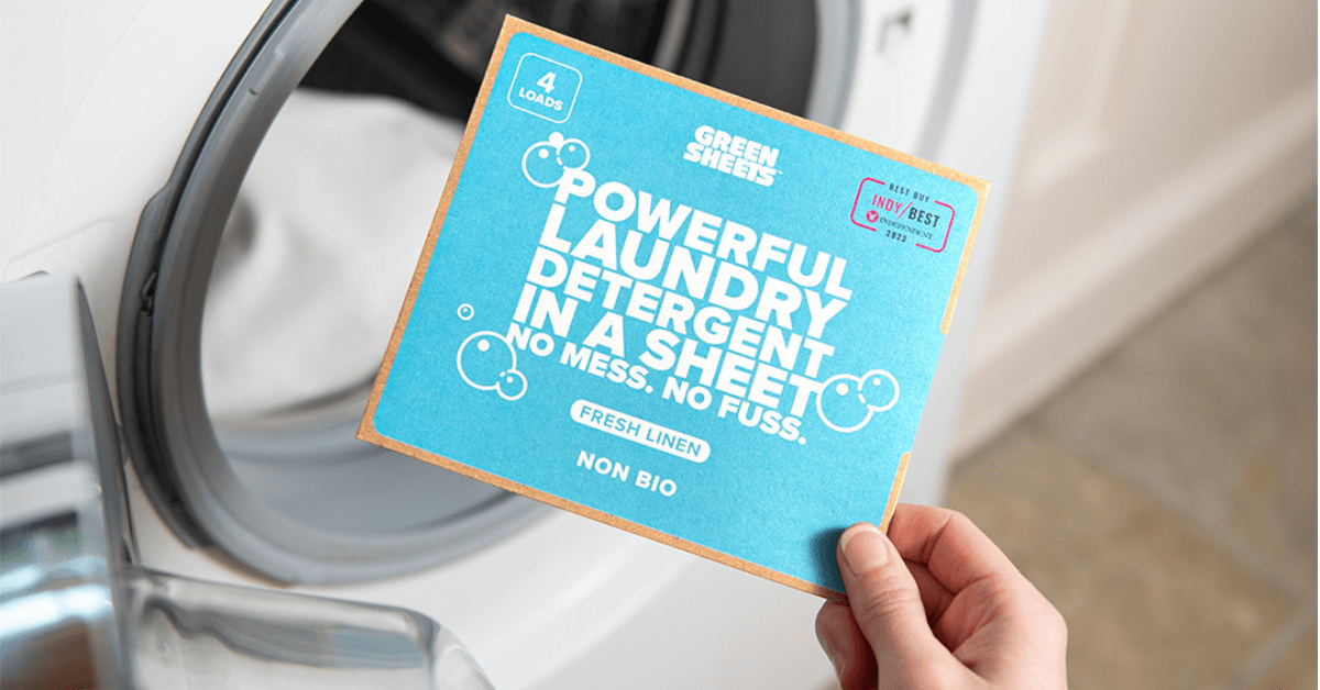laundry detergent greensheets sample perfect for travelling being held in hand