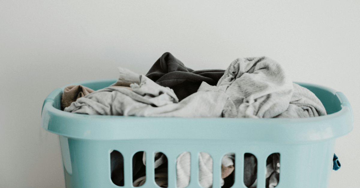 laundry basket full of clothes ready to be washed