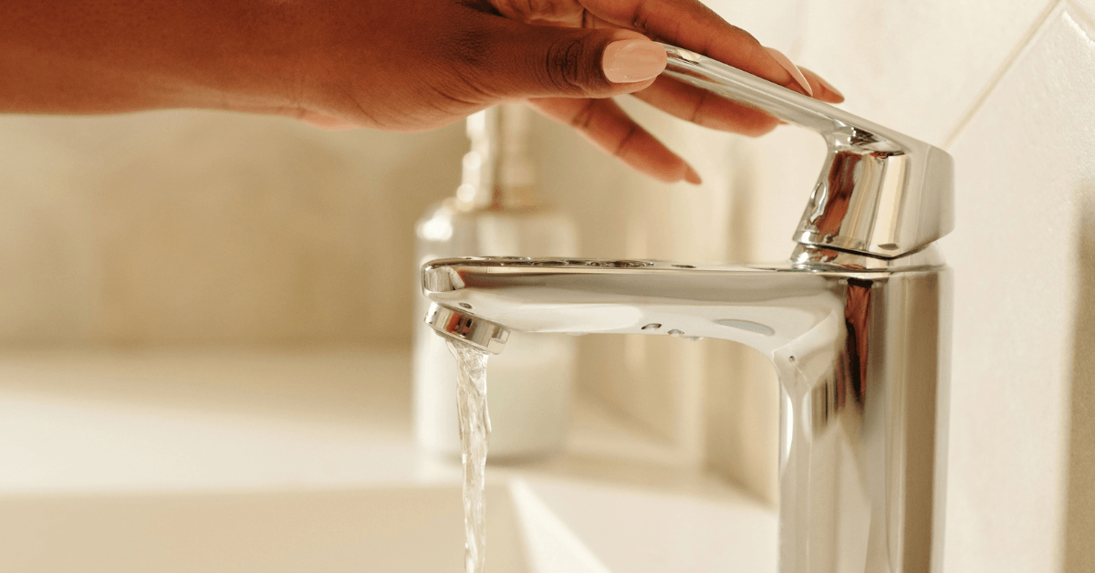 bathroom tap being switched off to save water when cleaning