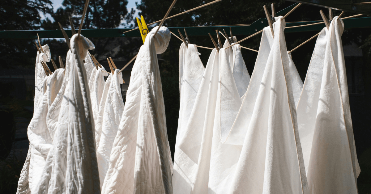 white washing hanging on laundry line after being washed