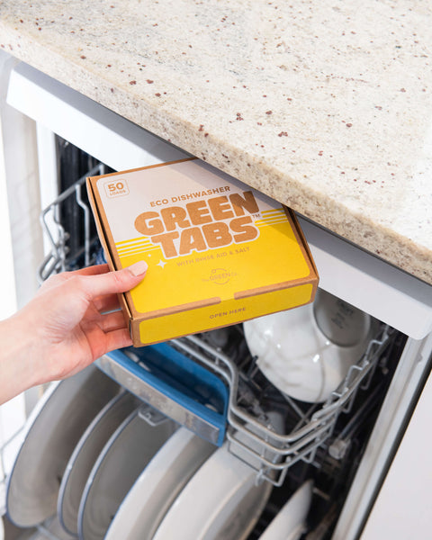 all in one dishwasher tablets being put away above the dishwasher